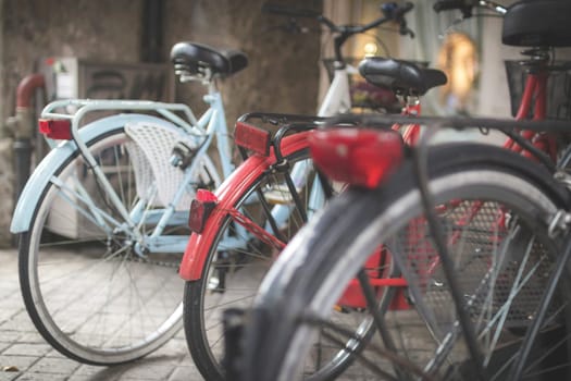 Vintage style bicycles, parked in the city. Details. Blurs.