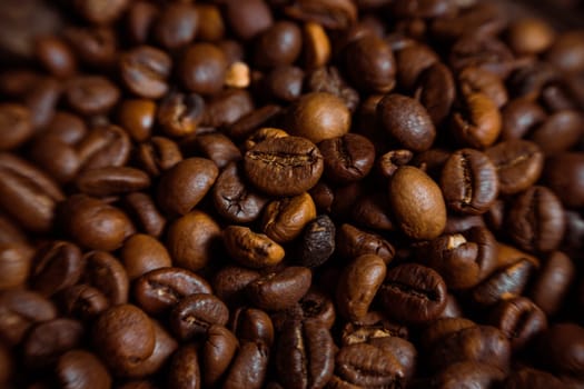 Coffee on grunge wooden background Fresh coffee beans on wood and linen bag, ready to brew delicious coffee