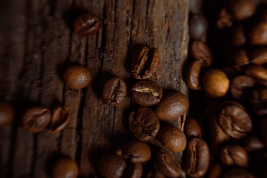 Coffee on grunge wooden background Fresh coffee beans on wood and linen bag, ready to brew delicious coffee
