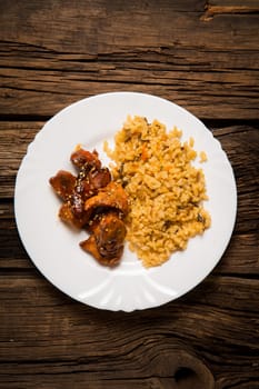 Delicious rice with chicken sauce, selective focus