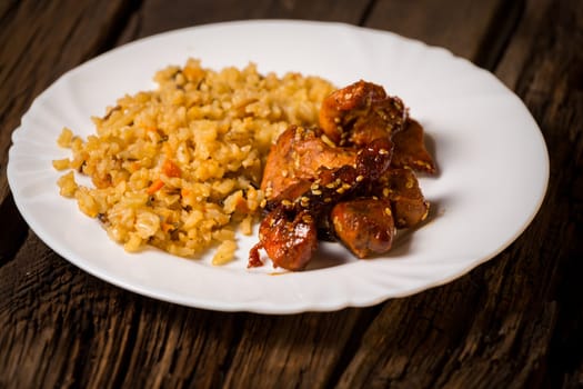Delicious rice with chicken sauce, selective focus