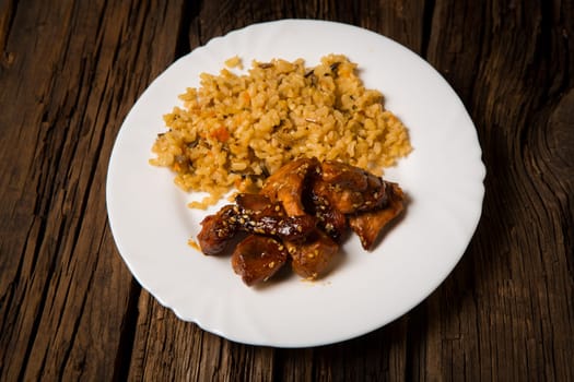 Delicious rice with chicken sauce, selective focus