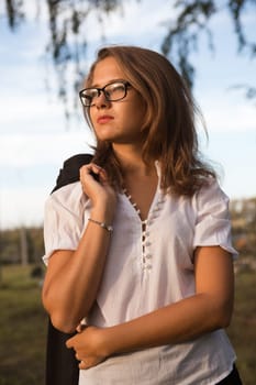 A beautiful young business woman walking outdoors