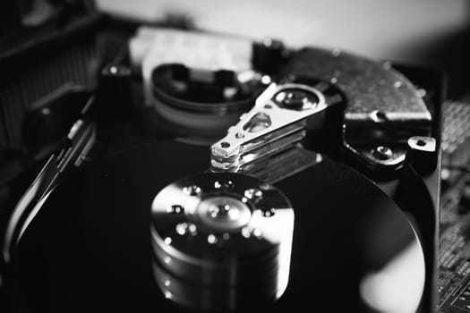 close up of hard disk with abstract reflection