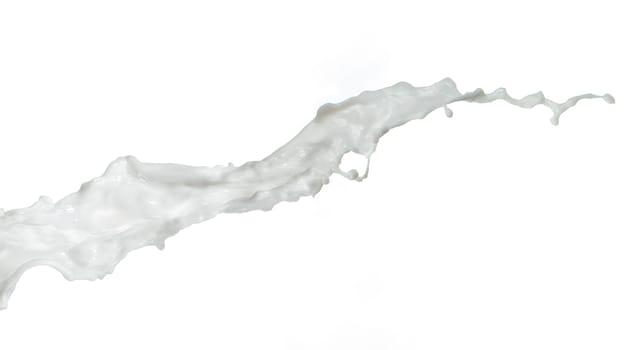 pouring milk or white liquid created splash