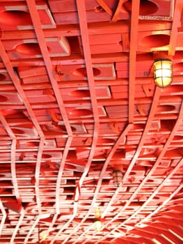 Red Life Jackets mounted in Ceiling of Boat