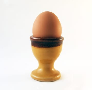 Isolated boiled egg in the cup