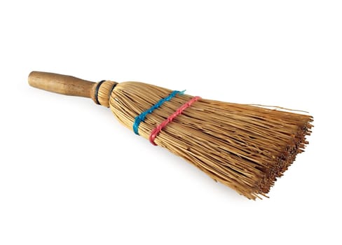 Short sweep traditional broom over white background