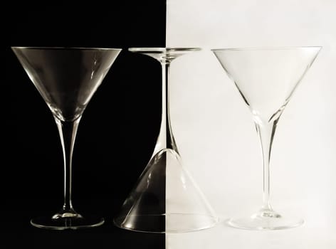 Three martini glasses on the black and white background