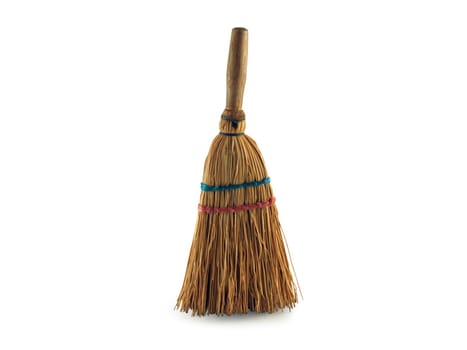 Short sweep traditional broom over white background