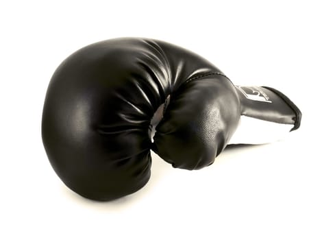 one black boxing glove isolated over white