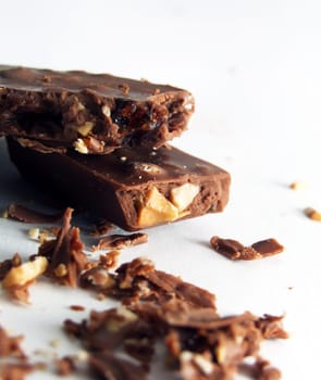 crumbled chocolate with hazelnuts over white