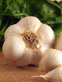 Garlic on wooden cutting board