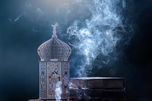 Ornamental Arabic lantern with with Holy Quran. Festive greeting card for Muslim holy month Ramadan Kareem.