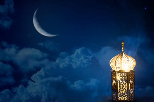 Ornamental Arabic lantern with crescent moon glowing at night. Festive greeting card for Muslim holy month Ramadan Kareem.