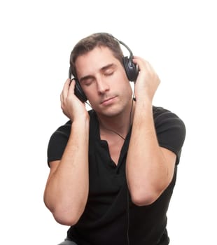handsome man listening the music. Isolated over white background