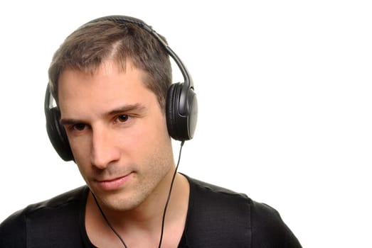Handsome man with headphones isolated over white