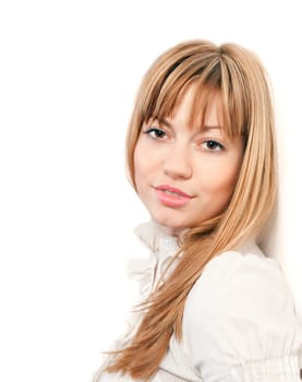 Portrait of beautiful young woman in white