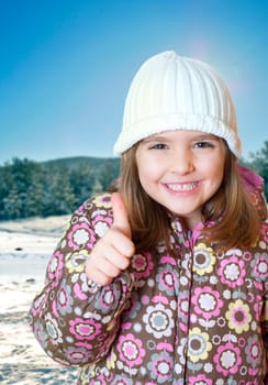 happy little playing in snow