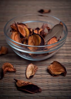 Zen-like composition with bowl of scented potpourri