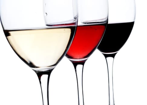 Three glass of wine over white background