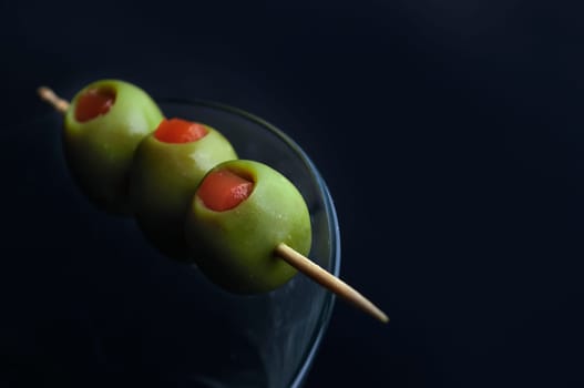 olives in martini glass