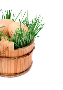 isolated eggs in the wooden basket