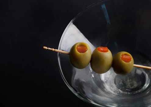 olives in martini glass