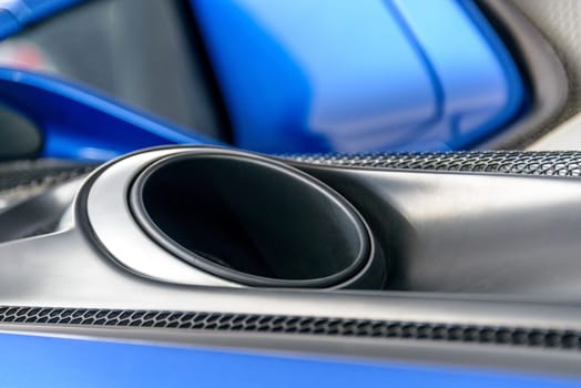 LONDON, UK - CIRCA JUNE 2014: Porsche 918 Spyder top mounted exhaust system detail shot.