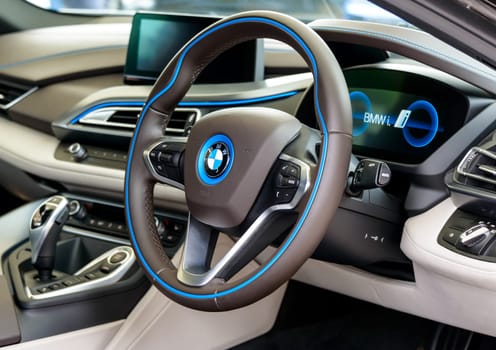 LONDON, UK - CIRCA JUNE 2014: BMW i8 dashboard. The BMW i8 is a plug-in hybrid sports car.