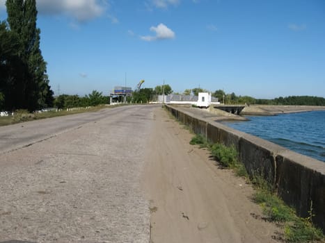 The road from the slabs along the reservoir. Old Reservoir Beach. Chyhyryn Nuclear Power Plant