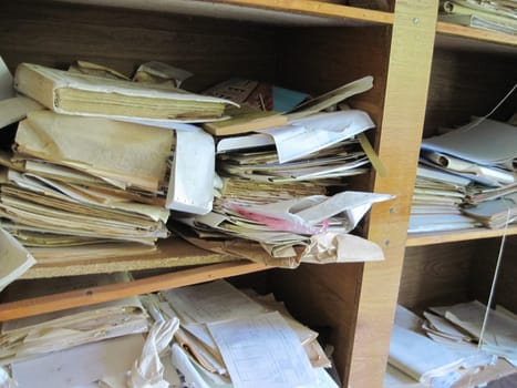 Old paper archives of an abandoned power plant. old unnecessary paper.