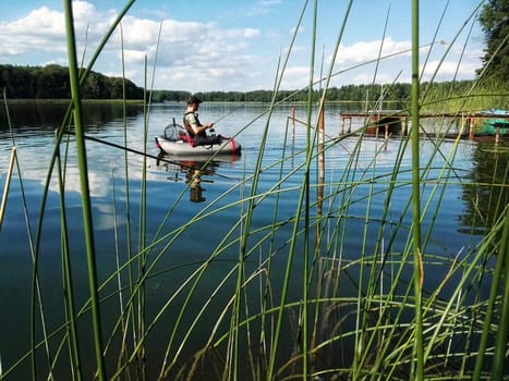 Anglers with belly boats on the Lübbesee