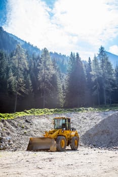 Wheel loader excavator is parking in a quarry