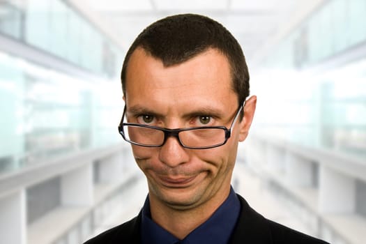 young silly businessman portrait at the office