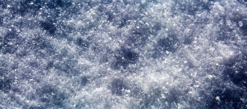 Winter background of shiny  snow