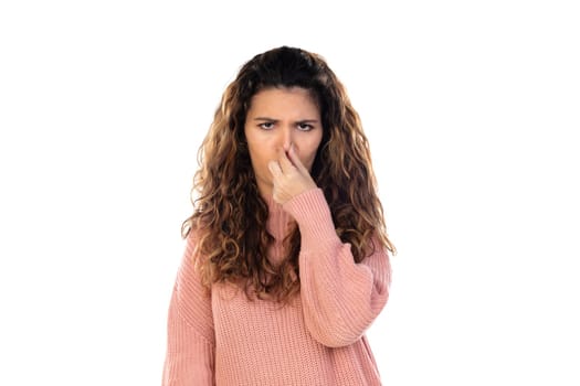 Beautiful middle aged woman with pink woolen sweater isolated on a white background