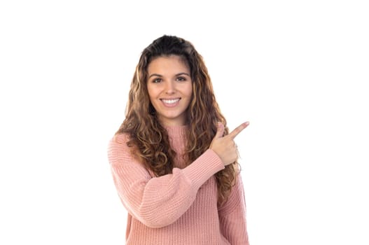 Beautiful middle aged woman with pink woolen sweater isolated on a white background