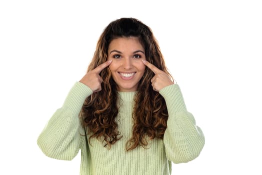 Beautiful woman with wavy hair wearing a green jersey isolated on a white background