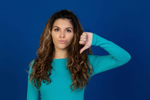 Portrait of beautiful caucasian girl with curly hair isolated on a white background