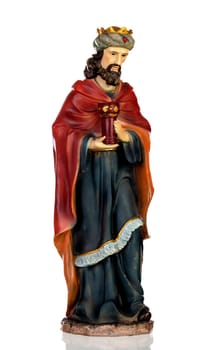 Gaspar, one of the three wise men. Ceramic figure isolated on white background