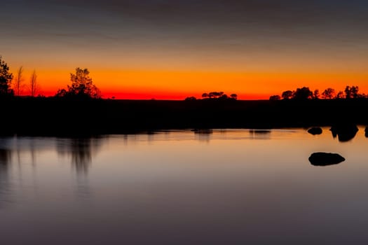 Beautiful landscape in a lake during the sunset with amazing colors