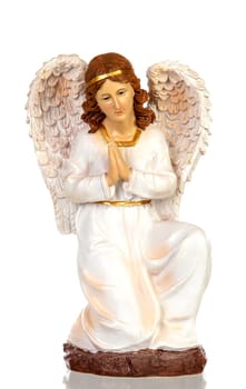Ceramic figure of the angel of the nativity scene isolated on a white background