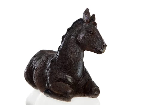 Figure of a mule for the Nativity Potal isolated on a white background