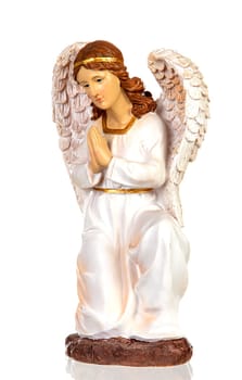 Ceramic figure of the angel of the nativity scene isolated on a white background