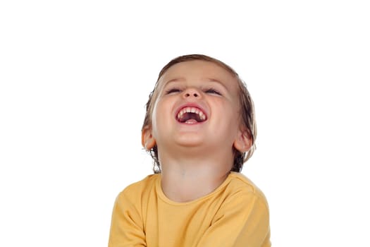 Adorable small child two years old with yellow t-shirt isolated on a white background