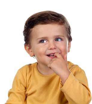 Adorable small child two years old sucking his hand
