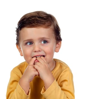 Adorable small child two years old sucking his hand