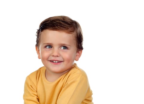 Adorable small child two years old with yellow t-shirt isolated on a white background