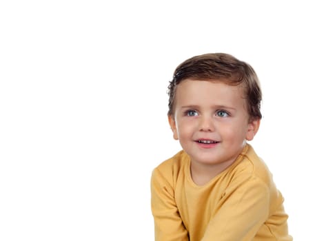 Adorable small child two years old with yellow t-shirt isolated on a white background